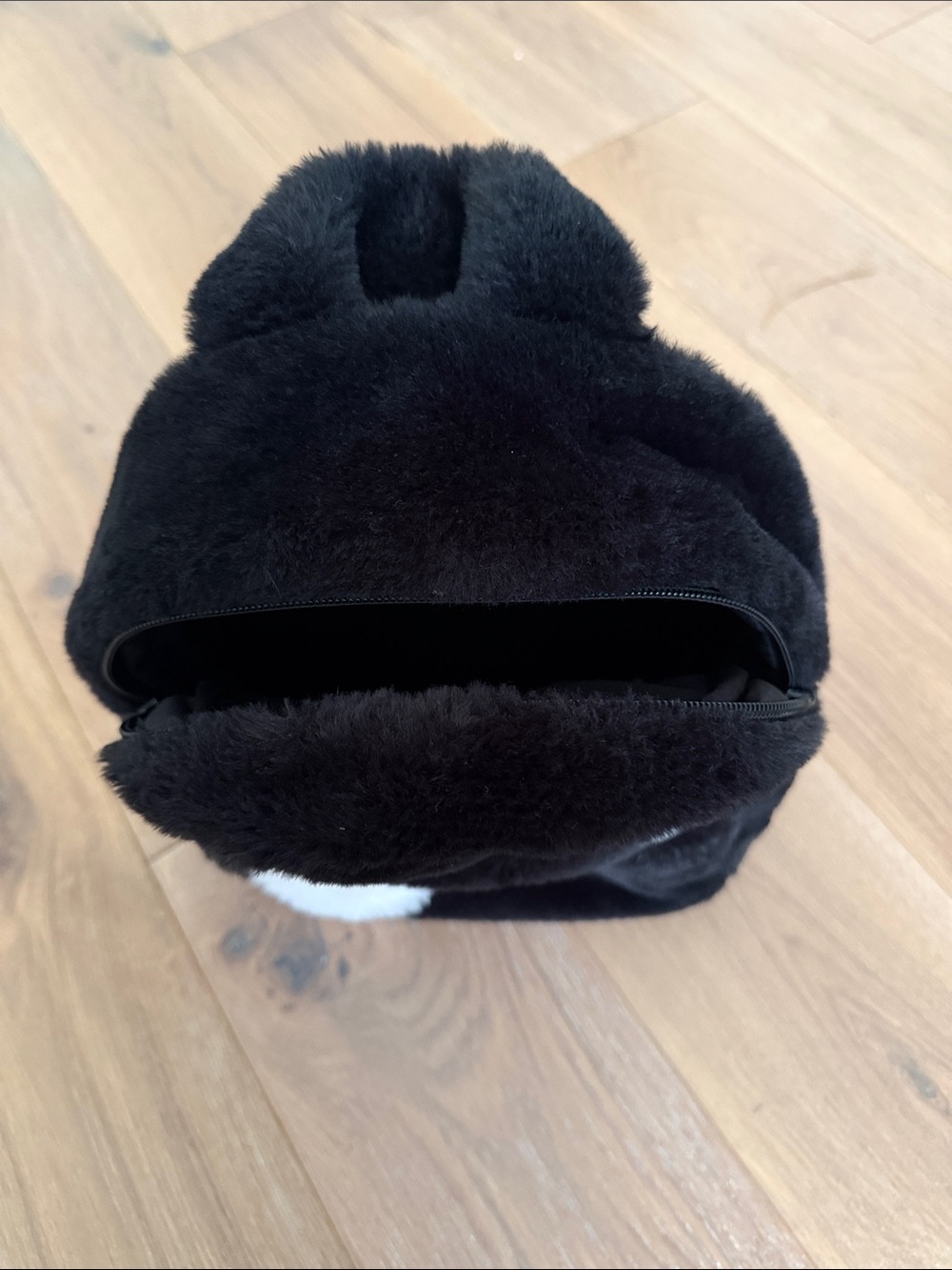 Cozy Black Faux Fur Backpack with White Swoosh - Picture 3 of 9